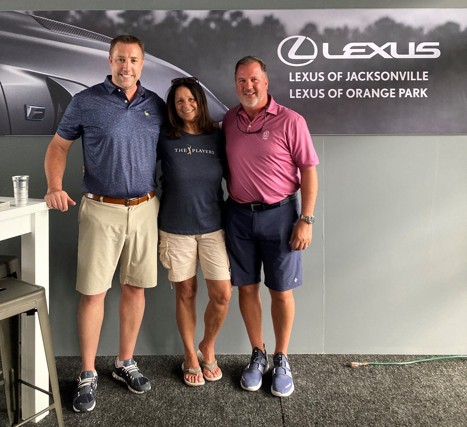 Pictured from left are: Brian Zehren, general manager, Lexus of Jacksonville; Gloria Dongara, AAA Travel;  and Garry Redig, vice president, Fields Automotive Group.